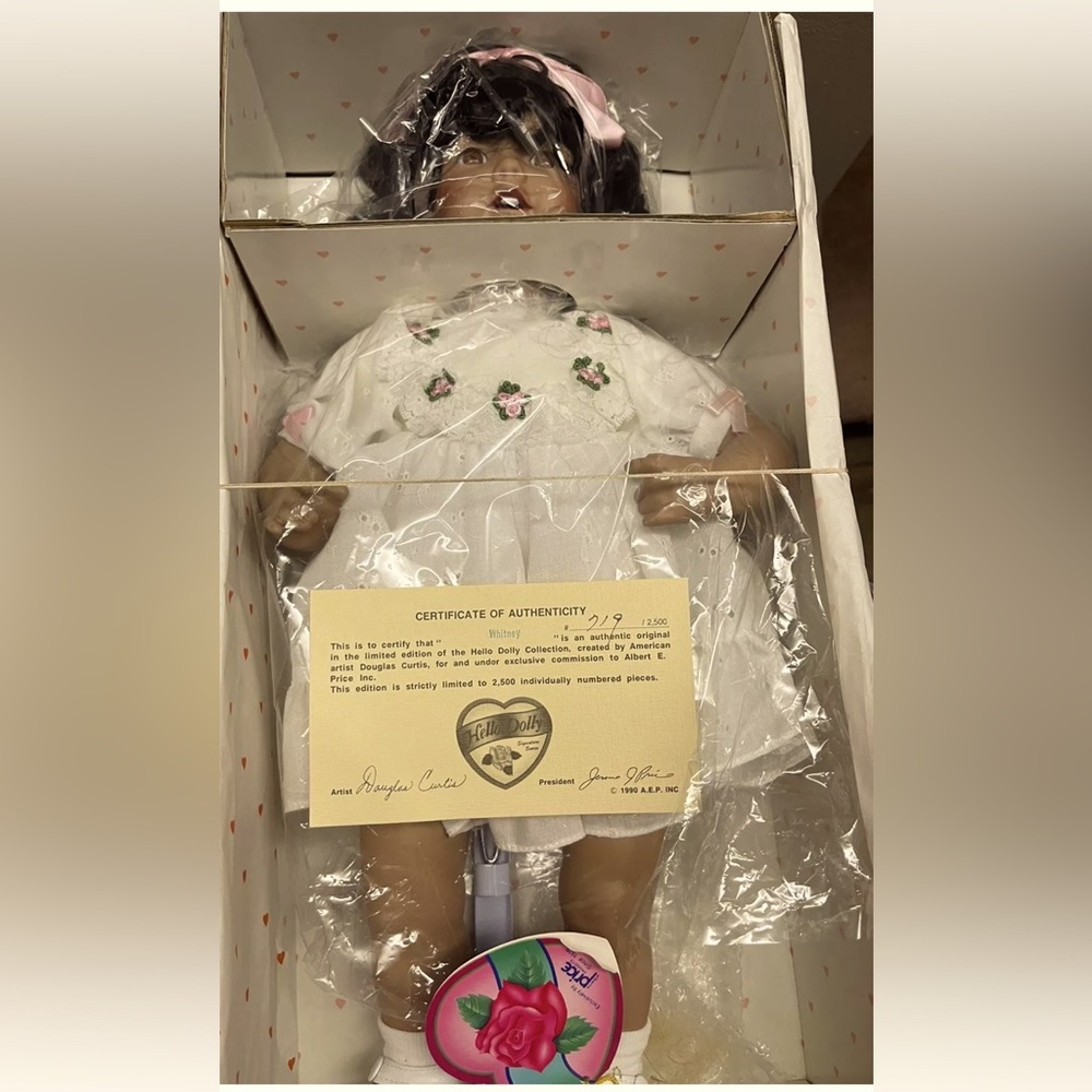 Vintage Hello Dolly porcelain doll.
